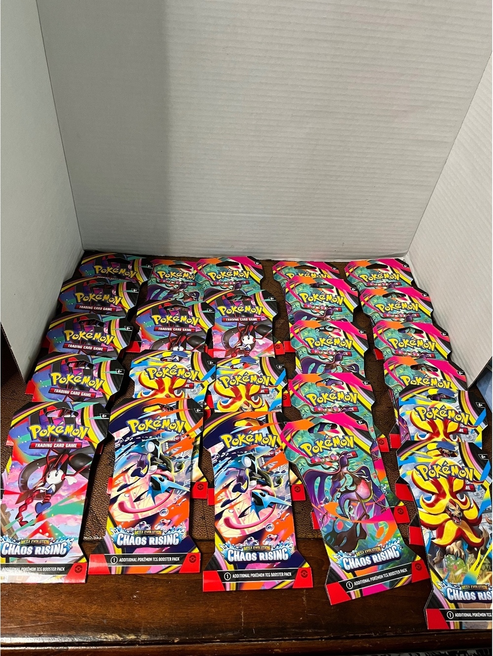 LOT of 24: 2026 Pokémon TCG: Mega Evolution Chaos Rising Booster Packs